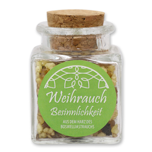 Incense in a square glass jar with a plug cork