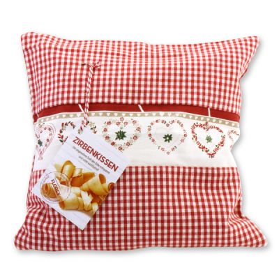 Swiss pine pillow 30x30cm with a red heart motive filled with swiss pine shavings 