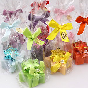 Sheep milk soap star 80g, decorated with a glass christmas star in a cellophane, sorted 
