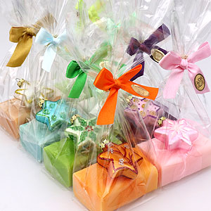 Sheep milk soap 100g, decorated with a glass christmas star in a cellophane, sorted 
